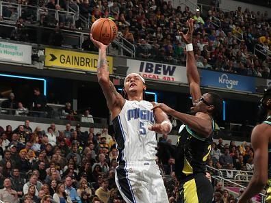 INDIANAPOLIS, IN - DECEMBER 23:  Paolo Banchero #5 of the Orlando Magic drives to the basket during the game against the Indiana Pacers on December 23, 2023 at Gainbridge Fieldhouse in Indianapolis, Indiana. NOTE TO USER: User expressly acknowledges and agrees that, by downloading and or using this Photograph, user is consenting to the terms and conditions of the Getty Images License Agreement. Mandatory Copyright Notice: Copyright 2023 NBAE (Photo by Pepper Robinson/NBAE via Getty Images)