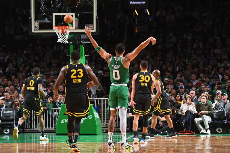 BOSTON, MA - MARCH 3: Jayson Tatum #0 of the Boston Celtics three point basket during the game against the Golden State Warriors on March 3, 2024 at the TD Garden in Boston, Massachusetts. NOTE TO USER: User expressly acknowledges and agrees that, by downloading and or using this photograph, User is consenting to the terms and conditions of the Getty Images License Agreement. Mandatory Copyright Notice: Copyright 2024 NBAE  (Photo by Brian Babineau/NBAE via Getty Images)