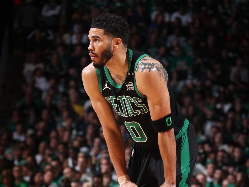 BOSTON, MA - JUNE 9: Jayson Tatum #0 of the Boston Celtics looks on during the game against the Dallas Mavericks during Game 1 of the 2024 NBA Finals on June 9, 2024 at the TD Garden in Boston, Massachusetts. NOTE TO USER: User expressly acknowledges and agrees that, by downloading and or using this photograph, User is consenting to the terms and conditions of the Getty Images License Agreement. Mandatory Copyright Notice: Copyright 2024 NBAE  (Photo by Nathaniel S. Butler/NBAE via Getty Images)