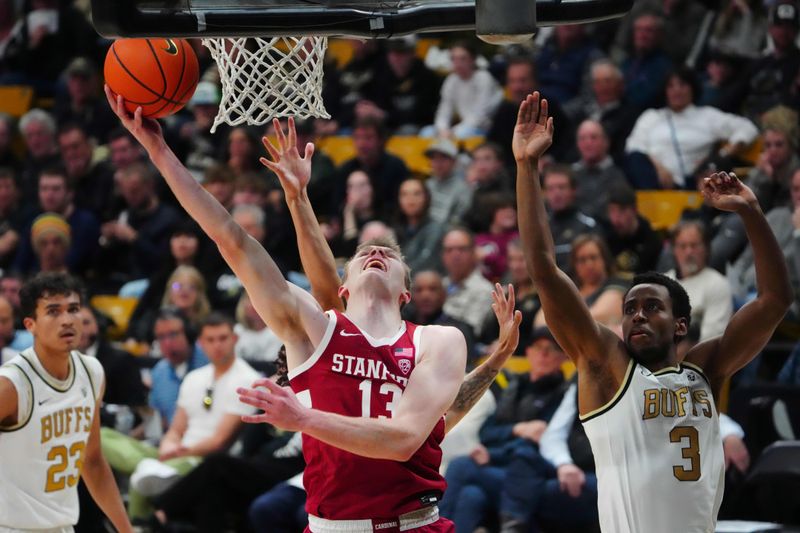 Feb 5, 2023; Boulder, Colorado, USA; Stanford Cardinal guard Michael Jones (13) shoots the ball past Colorado Buffaloes guard Jalen Gabbidon (3) in the first half at the CU Events Center. Mandatory Credit: Ron Chenoy-USA TODAY Sports