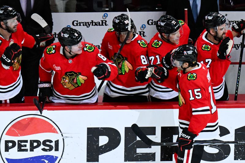 Oct 19, 2024; Chicago, Illinois, USA;  Chicago Blackhawks center Craig Smith (15) celebrates with teammates after scoring a goal against the Buffalo Sabres during the second period at the United Center. Mandatory Credit: Matt Marton-Imagn Images