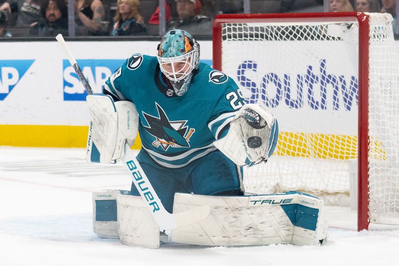 Dec 21, 2023; San Jose, California, USA; San Jose Sharks goaltender Mackenzie Blackwood (29) stops the puck during the first period against the Arizona Coyotes at SAP Center at San Jose. Mandatory Credit: Stan Szeto-USA TODAY Sports