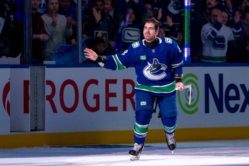 Apr 8, 2024; Vancouver, British Columbia, CAN;Vancouver Canucks forward Conor Garland (8) skates out as the game’s first star against the Vegas Golden Knights at Rogers Arena. Canucks won 4 -3. Mandatory Credit: Bob Frid-USA TODAY Sports