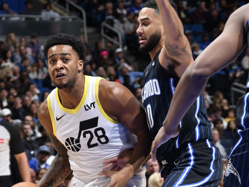 ORLANDO, FL - JANUARY 5 :  Brice Sensabaugh #28 of the Utah Jazz dribbles the ball during the game against the Orlando Magic on January 5, 2025 at Kia Center in Orlando, Florida. NOTE TO USER: User expressly acknowledges and agrees that, by downloading and or using this photograph, User is consenting to the terms and conditions of the Getty Images License Agreement. Mandatory Copyright Notice: Copyright 2025 NBAE (Photo by Fernando Medina/NBAE via Getty Images)