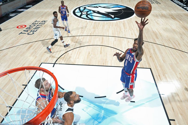 MINNEAPOLIS, MN -  NOVEMBER 27: Malik Monk #0 of the Sacramento Kings shoots the ball during the game against the Minnesota Timberwolves on November 27, 2024 at Target Center in Minneapolis, Minnesota. NOTE TO USER: User expressly acknowledges and agrees that, by downloading and or using this Photograph, user is consenting to the terms and conditions of the Getty Images License Agreement. Mandatory Copyright Notice: Copyright 2024 NBAE (Photo by David Sherman/NBAE via Getty Images)