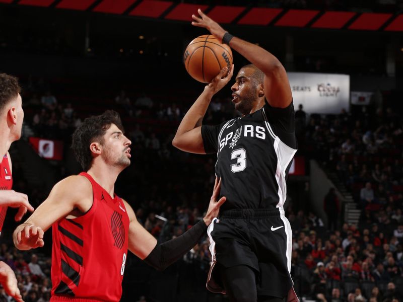 PORTLAND, OR - DECEMBER 13: Chris Paul #3 of the San Antonio Spurs passes the ball during the game against the Portland Trail Blazers on December 13, 2024 at the Moda Center Arena in Portland, Oregon. NOTE TO USER: User expressly acknowledges and agrees that, by downloading and or using this photograph, user is consenting to the terms and conditions of the Getty Images License Agreement. Mandatory Copyright Notice: Copyright 2024 NBAE (Photo by Cameron Browne/NBAE via Getty Images)