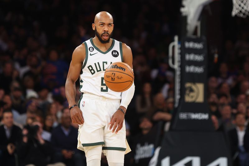 NEW YORK, NEW YORK - NOVEMBER 30: Jevon Carter #5 of the Milwaukee Bucks in action against the New York Knicks at Madison Square Garden on November 30, 2022 in New York City. NOTE TO USER: User expressly acknowledges and agrees that, by downloading and or using this Photograph, user is consenting to the terms and conditions of the Getty Images License Agreement. Milwaukee Bucks defeated the New York Knicks 109-103. (Photo by Mike Stobe/Getty Images)