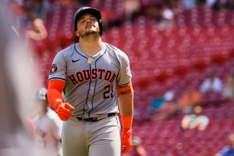 Sep 5, 2024; Cincinnati, Ohio, USA; Houston Astros catcher Yainer Diaz (21) reacts after a play in the eighth inning against the Cincinnati Reds at Great American Ball Park. Mandatory Credit: Katie Stratman-Imagn Images