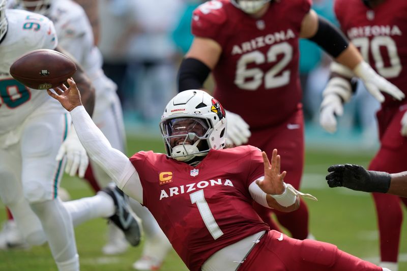 Arizona Cardinals quarterback Kyler Murray (1) throws the football during the first half of an NFL football game against the Miami Dolphins, Sunday, Oct. 27, 2024, in Miami Gardens, Fla. (AP Photo/Lynne Sladky)