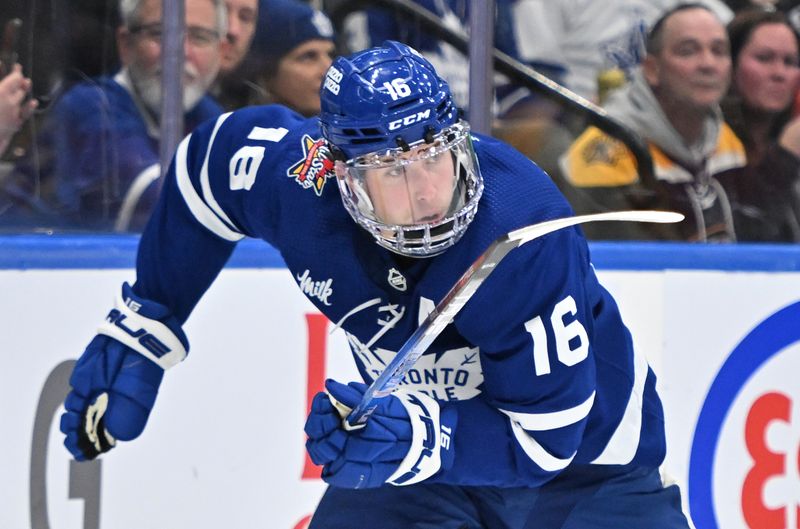 Dec 2, 2023; Toronto, Ontario, CAN; Toronto Maple Leafs forward Mitchell Marner (16) pursues the play against the Boston Bruins in the third period at Scotiabank Arena. Mandatory Credit: Dan Hamilton-USA TODAY Sports