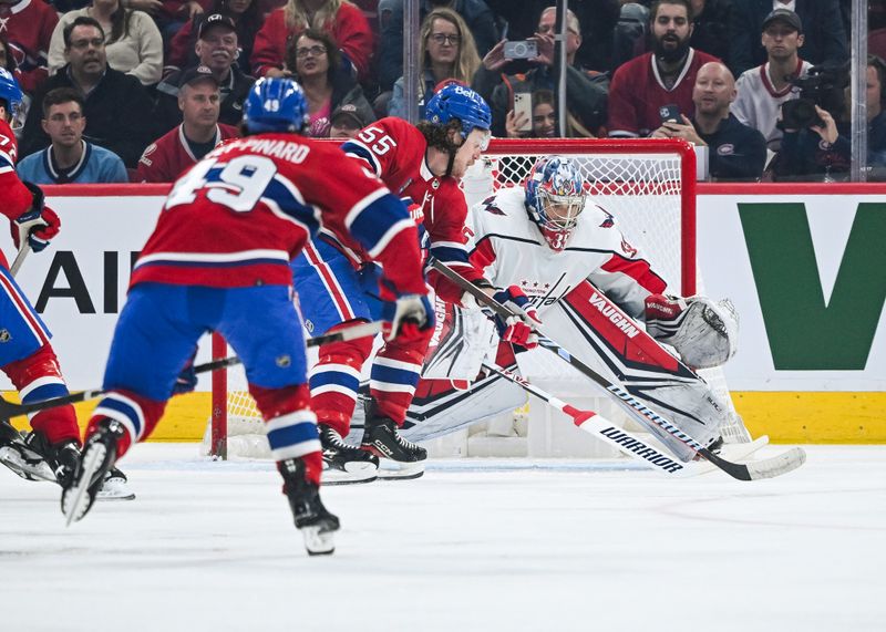 Oct 21, 2023; Montreal, Quebec, CAN; Montreal Canadiens left wing Michael Pezzetta (55) shoots the puck on Washington Capitals goalie Darcy Kuemper (35) during the first period at Bell Centre. Mandatory Credit: David Kirouac-USA TODAY Sports