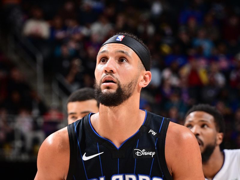 DETROIT, MI - JANUARY 1: Jalen Suggs #4 of the Orlando Magic free throw during the game against the Detroit Pistons on January 1, 2025 at Little Caesars Arena in Detroit, Michigan. NOTE TO USER: User expressly acknowledges and agrees that, by downloading and/or using this photograph, User is consenting to the terms and conditions of the Getty Images License Agreement. Mandatory Copyright Notice: Copyright 2025 NBAE (Photo by Chris Schwegler/NBAE via Getty Images)
