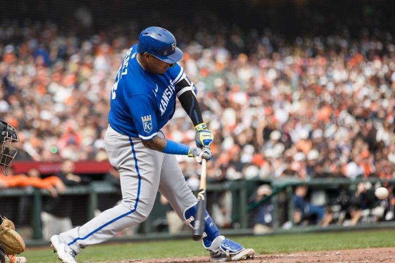 Apr 8, 2023; San Francisco, California, USA;  Kansas City Royals catcher Salvador Perez (13) hits a three-run home run against the San Francisco Giants during the eighth inning at Oracle Park. Mandatory Credit: John Hefti-USA TODAY Sports