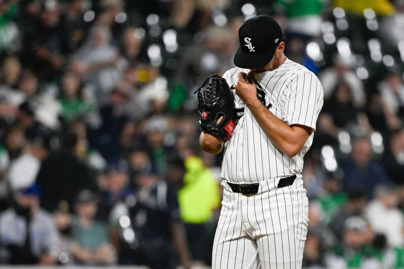 Sep 20, 2025; Chicago, Illinois, USA;  Chicago White Sox pitcher Fraser Ellard (55)  wipes his face after the San Diego Padres scored during the sixth inning at Rate Field. Mandatory Credit: Matt Marton-Imagn Images