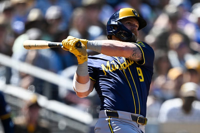 Sep 24, 2025; San Diego, California, USA; Milwaukee Brewers left fielder Jake Bauers (9) hits a double during the second inning against the San Diego Padres at Petco Park. Mandatory Credit: Denis Poroy-Imagn Images