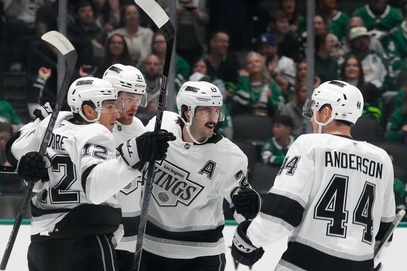 Feb 28, 2025; Dallas, Texas, USA;  The Los Angeles Kings celebrate after a goal scored by left wing Warren Foegele (37) during the first period against the Dallas Stars at American Airlines Center. Mandatory Credit: Chris Jones-Imagn Images