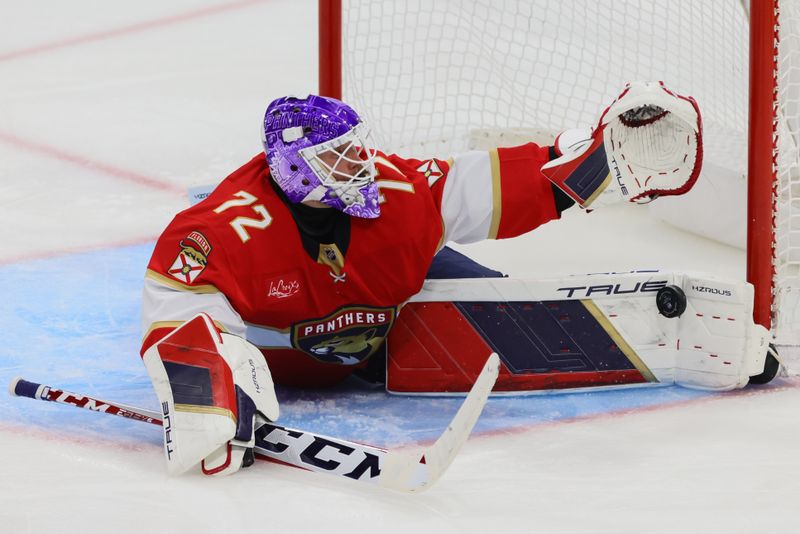 Nov 14, 2024; Sunrise, Florida, USA; Florida Panthers goaltender Sergei Bobrovsky (72) makes a save against New Jersey Devils right wing Timo Meier (28) during the third period at Amerant Bank Arena. Mandatory Credit: Sam Navarro-Imagn Images