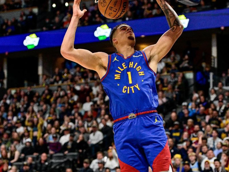 DENVER, COLORADO - MARCH 9: Michael Porter Jr. #1 of the Denver Nuggets dunks the ball against the Utah Jazz in the first half at Ball Arena on March 9, 2024 in Denver, Colorado. (Photo by Dustin Bradford/Getty Images)