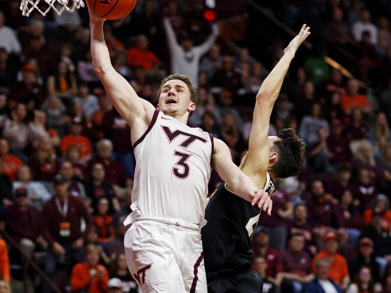 Mar 2, 2024; Blacksburg, Virginia, USA; Virginia Tech Hokies guard Sean Pedulla (3) shoots the ball against Wake Forest Demon Deacons guard Parker Friedrichsen (20) during the second half at Cassell Coliseum. Mandatory Credit: Peter Casey-USA TODAY Sports