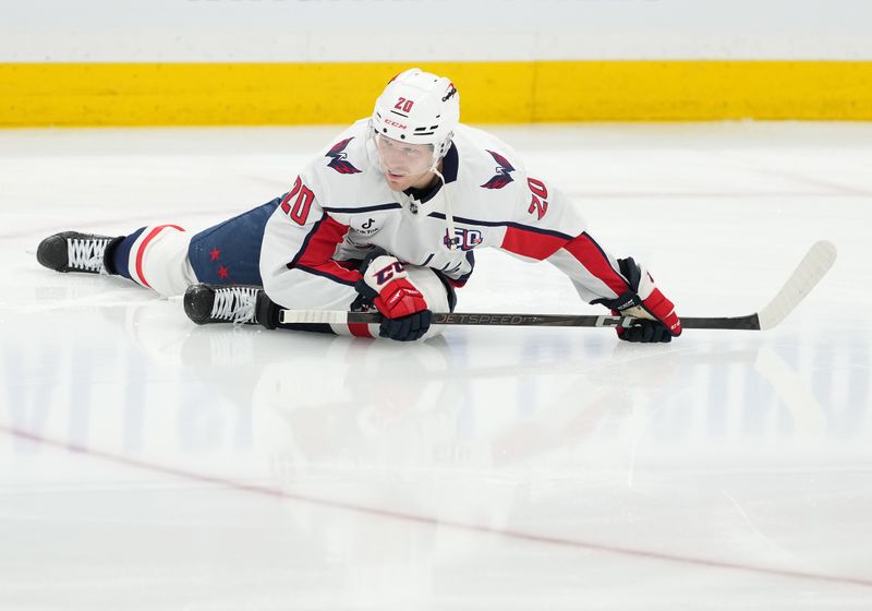 Dec 6, 2024; Toronto, Ontario, CAN;  Washington Capitals center Lars Eller (20) stretches during the warmup before a game against the Toronto Maple Leafs at Scotiabank Arena. Mandatory Credit: Nick Turchiaro-Imagn Images