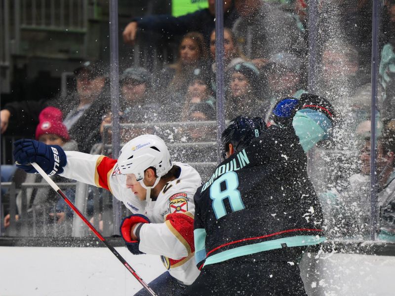 Dec 12, 2023; Seattle, Washington, USA; Florida Panthers center Eetu Luostarinen (27) checks Seattle Kraken defenseman Brian Dumoulin (8) into the wall during the first period at Climate Pledge Arena. Mandatory Credit: Steven Bisig-USA TODAY Sports.