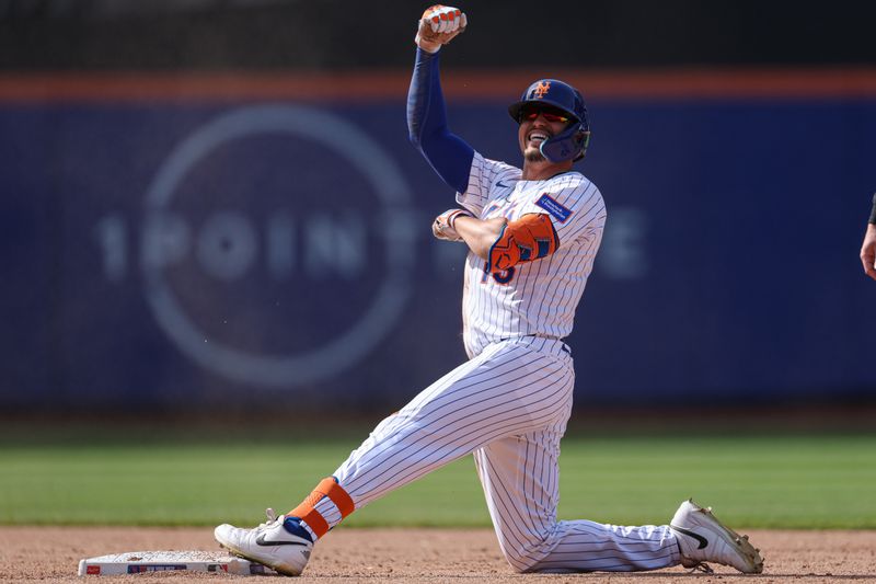Apr 20, 2025; New York City, New York, USA; New York Mets right fielder Tyrone Taylor (15) reacts after hitting an RBI double during the eighth inning against the St. Louis Cardinals at Citi Field. Mandatory Credit: Vincent Carchietta-Imagn Images