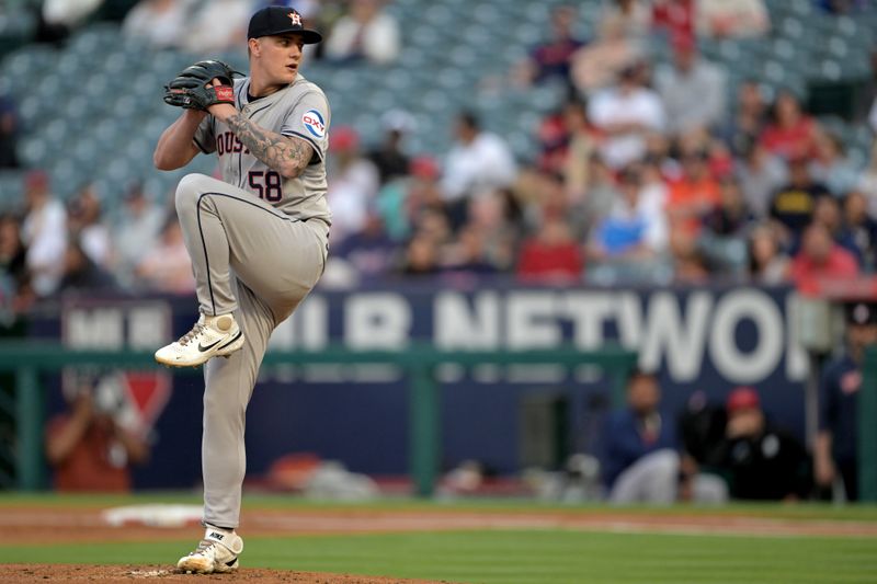 Jun 8, 2024; Anaheim, California, USA;  Houston Astros starting pitcher Hunter Brown (58) delivers to the plate in the first inning against the Los Angeles Angels at Angel Stadium. Mandatory Credit: Jayne Kamin-Oncea-USA TODAY Sports