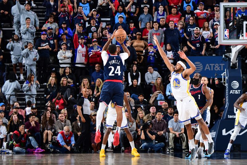 INGLEWOOD, CA - NOVEMBER 18: Norman Powell #24 of the LA Clippers shoots a three point basket during the game against the Golden State Warriors on November 18, 2024 at Intuit Dome in Los Angeles, California. NOTE TO USER: User expressly acknowledges and agrees that, by downloading and/or using this Photograph, user is consenting to the terms and conditions of the Getty Images License Agreement. Mandatory Copyright Notice: Copyright 2024 NBAE (Photo by Adam Pantozzi/NBAE via Getty Images)