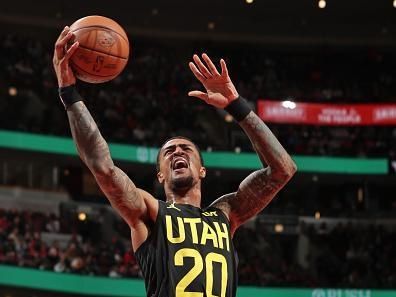 CHICAGO, IL - NOVEMBER 6: John Collins #20 of the Utah Jazz drives to the basket during the game against the Chicago Bulls on November 6, 2023 at the United Center in Chicago, Illinois. NOTE TO USER: User expressly acknowledges and agrees that, by downloading and or using this Photograph, user is consenting to the terms and conditions of the Getty Images License Agreement. Mandatory Copyright Notice: Copyright 2023 NBAE (Photo by Gary Dineen/NBAE via Getty Images).