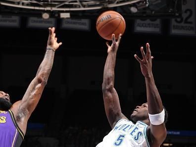 MINNEAPOLIS, MN -  DECEMBER 30: Anthony Edwards #5 of the Minnesota Timberwolves shoots the ball during the game against the Los Angeles Lakers on December 30, 2023 at Target Center in Minneapolis, Minnesota. NOTE TO USER: User expressly acknowledges and agrees that, by downloading and or using this Photograph, user is consenting to the terms and conditions of the Getty Images License Agreement. Mandatory Copyright Notice: Copyright 2023 NBAE (Photo by David Sherman/NBAE via Getty Images)