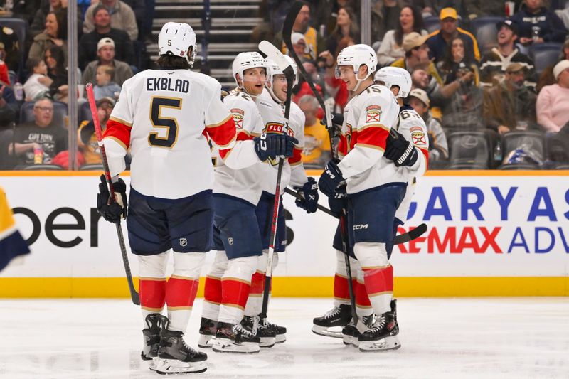 Nov 24, 2025; Nashville, Tennessee, USA;  Florida Panthers defenseman Gustav Forsling (42) celebrates with his teammates after scoring a goal against the Nashville Predators during the second period at Bridgestone Arena. Mandatory Credit: Steve Roberts-Imagn Images