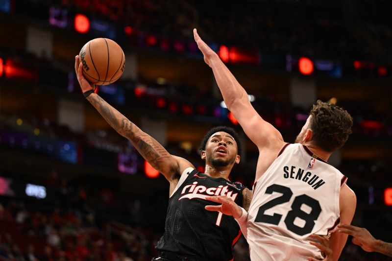 HOUSTON, TEXAS - NOVEMBER 23: Anfernee Simons #1 of the Portland Trail Blazers shoots the ball as Alperen Sengun #28 of the Houston Rockets defends at Toyota Center on November 23, 2024 in Houston, Texas. NOTE TO USER: User expressly acknowledges and agrees that, by downloading and or using this photograph, User is consenting to the terms and conditions of the Getty Images License Agreement. (Photo by Jack Gorman/Getty Images)