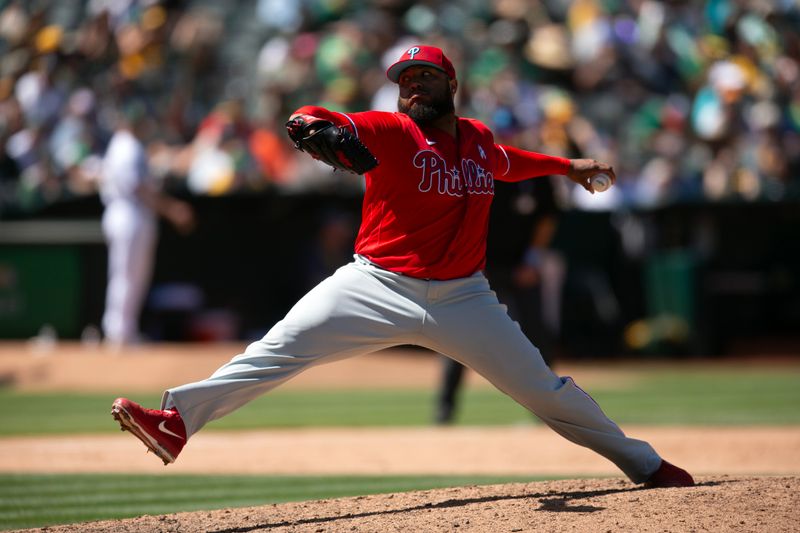 Jun 18, 2023; Oakland, California, USA; Philadelphia Phillies pitcher Jose Alvarado (46) delivers a pitch against the Oakland Athletics during the eighth inning at Oakland-Alameda County Coliseum. Mandatory Credit: D. Ross Cameron-USA TODAY Sports