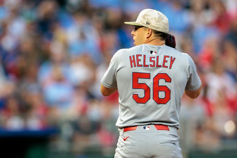 May 17, 2025; Kansas City, Missouri, USA; St. Louis Cardinals pitcher Ryan Helsley (56) pitches during the ninth inning against the Kansas City Royals at Kauffman Stadium. Mandatory Credit: William Purnell-Imagn Images