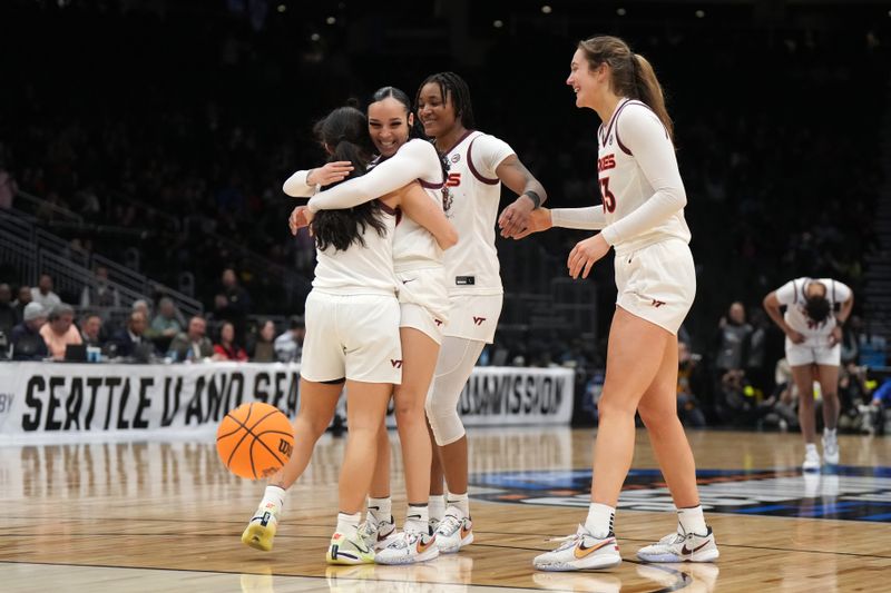 Mar 27, 2023; Seattle, WA, USA; Virginia Tech Hokies players celebrate on the court after defeating the Ohio State Buckeyes at Climate Pledge Arena. Mandatory Credit: Kirby Lee-USA TODAY Sports 