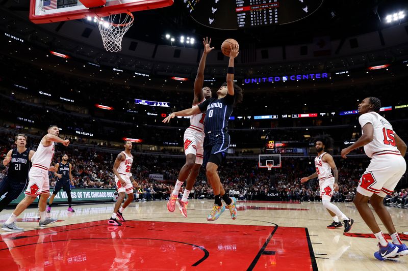 CHICAGO, IL - OCTOBER 30: Anthony Black #0 of the Orlando Magic drives to the basket during the game against the Chicago Bulls on October 30, 2024 at United Center in Chicago, Illinois. NOTE TO USER: User expressly acknowledges and agrees that, by downloading and or using this photograph, User is consenting to the terms and conditions of the Getty Images License Agreement. Mandatory Copyright Notice: Copyright 2024 NBAE (Photo by Kamil Krzaczynski/NBAE via Getty Images)