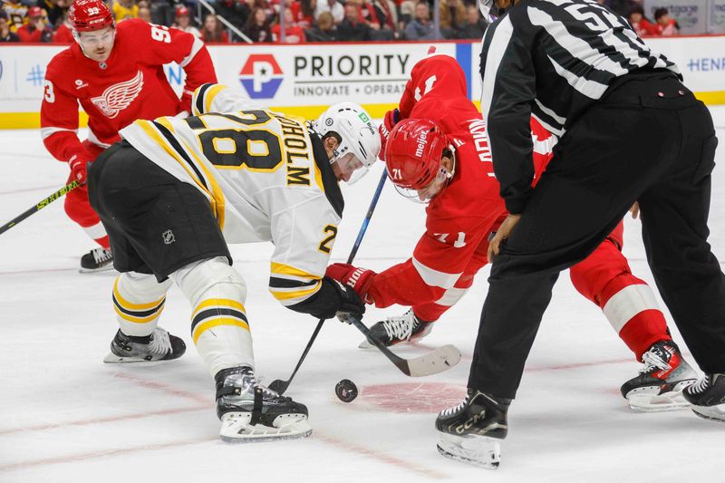 Nov 23, 2024; Detroit, Michigan, USA; Boston Bruins center Elias Lindholm (28) faces off against Detroit Red Wings center Dylan Larkin (71) during the second period of the game at Little Caesars Arena. Mandatory Credit: Brian Bradshaw Sevald-Imagn Images