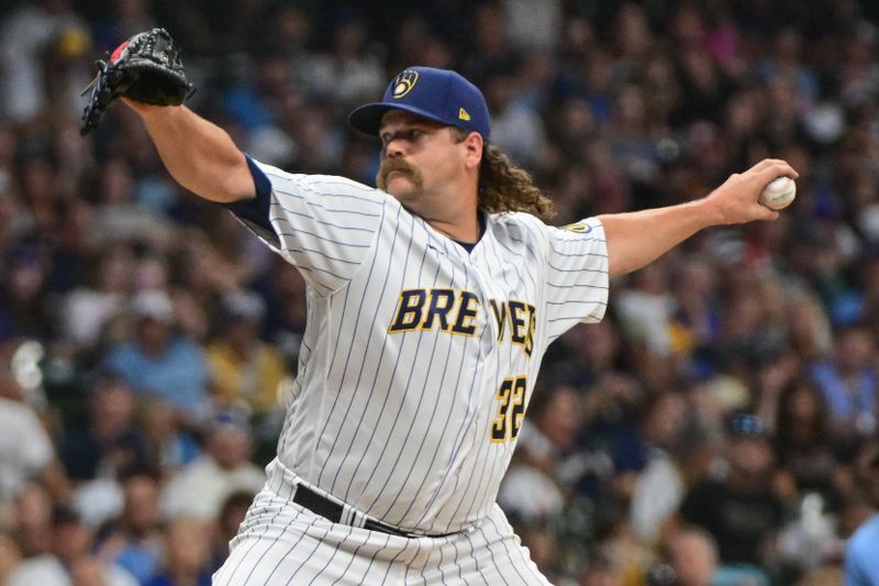 Aug 5, 2023; Milwaukee, Wisconsin, USA;  Milwaukee Brewers pitcher Andrew Chafin (32) pitches against the Pittsburgh Pirates in the eighth inning at American Family Field. Mandatory Credit: Benny Sieu-USA TODAY Sports