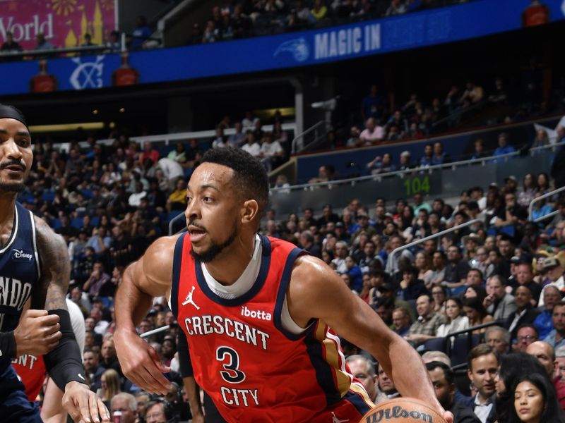 ORLANDO, FL - MARCH 21: CJ McCollum #3 of the New Orleans Pelicans dribbles the ball during the game against the Orlando Magic on March 21, 2024 at Amway Center in Orlando, Florida. NOTE TO USER: User expressly acknowledges and agrees that, by downloading and or using this photograph, User is consenting to the terms and conditions of the Getty Images License Agreement. Mandatory Copyright Notice: Copyright 2024 NBAE (Photo by Fernando Medina/NBAE via Getty Images)