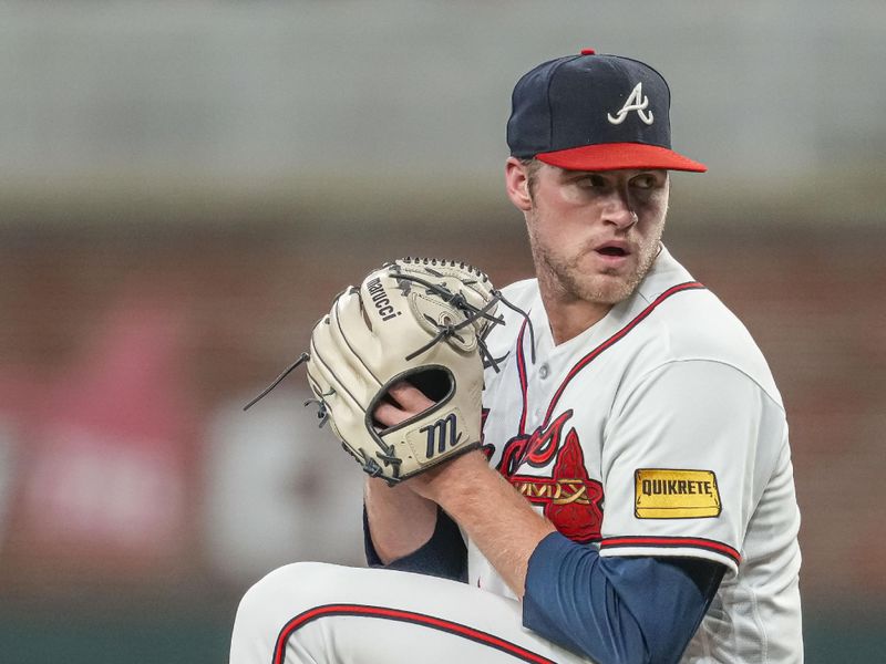 Aug 15, 2023; Cumberland, Georgia, USA; Atlanta Braves starting pitcher Bryce Elder (55) pitches against the New York Yankees during the seventh inning at Truist Park. Mandatory Credit: Dale Zanine-USA TODAY Sports