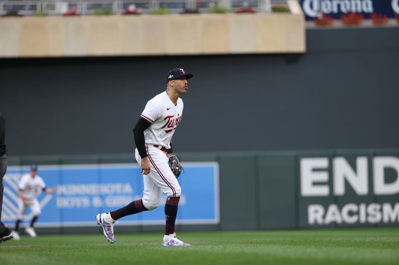 Oct 4, 2023; Minneapolis, Minnesota, USA; Minnesota Twins shortstop Carlos Correa (4) celebrates a play in the fifth inning against the Toronto Blue Jays during game two of the Wildcard series for the 2023 MLB playoffs at Target Field. Mandatory Credit: Jesse Johnson-USA TODAY Sports