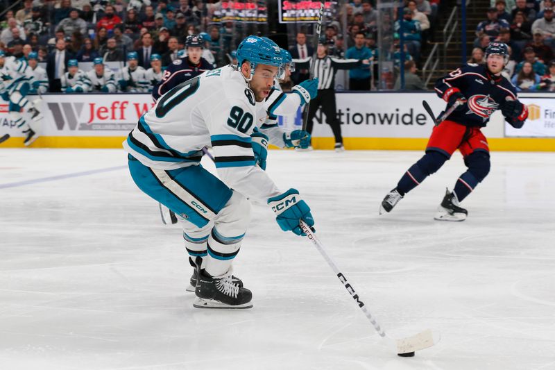 Mar 16, 2024; Columbus, Ohio, USA; San Jose Sharks right wing Justin Bailey (90) controls the puck against the Columbus Blue Jackets during the second period at Nationwide Arena. Mandatory Credit: Russell LaBounty-USA TODAY Sports