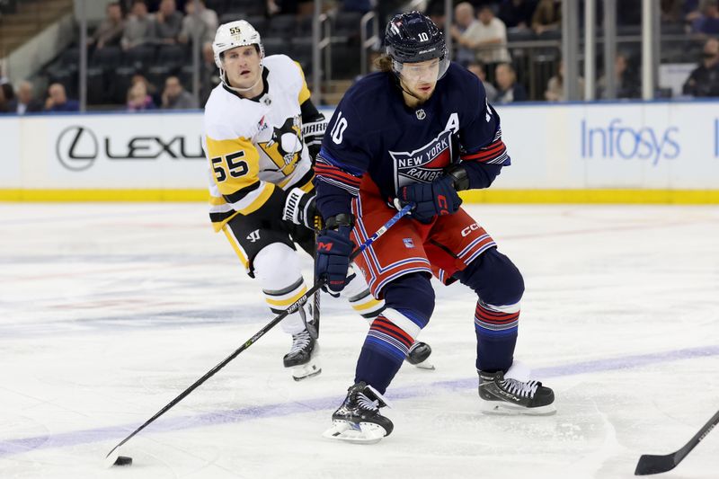 Dec 6, 2024; New York, New York, USA; New York Rangers left wing Artemi Panarin (10) skates with the puck past Pittsburgh Penguins center Noel Acciari (55) during the third period at Madison Square Garden. Mandatory Credit: Brad Penner-Imagn Images