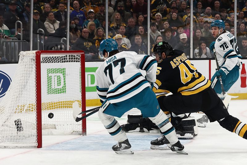 Mar 12, 2026; Boston, Massachusetts, USA; San Jose Sharks center Michael Misa (77) scores into an ermpty net off a pass by left wing William Eklund (72) during the first period against the Boston Bruins at TD Garden. Mandatory Credit: Winslow Townson-Imagn Images