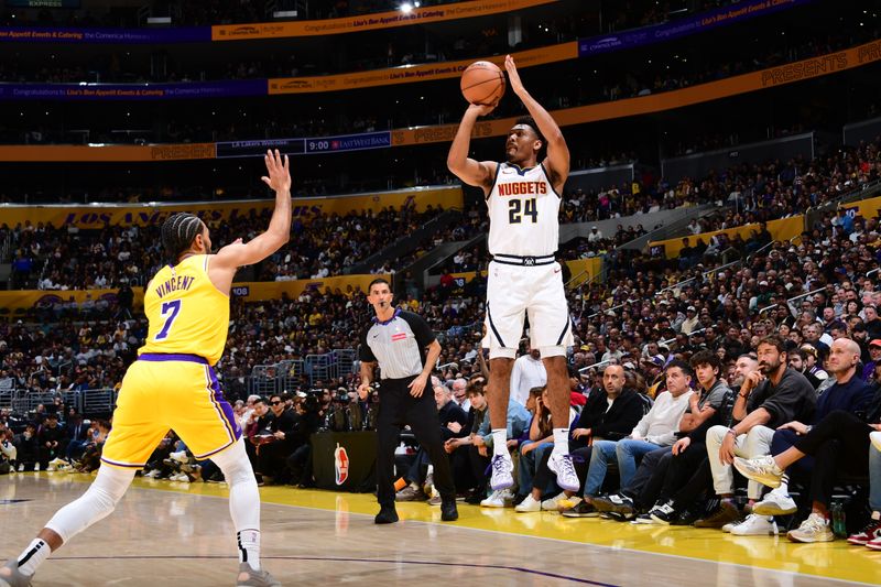 LOS ANGELES, CA - MARCH 19: Jalen Pickett #24 of the Denver Nuggets shoots the ball during the game against the Los Angeles Lakers on March 19, 2025 at Crypto.Com Arena in Los Angeles, California. NOTE TO USER: User expressly acknowledges and agrees that, by downloading and/or using this Photograph, user is consenting to the terms and conditions of the Getty Images License Agreement. Mandatory Copyright Notice: Copyright 2025 NBAE (Photo by Adam Pantozzi/NBAE via Getty Images)