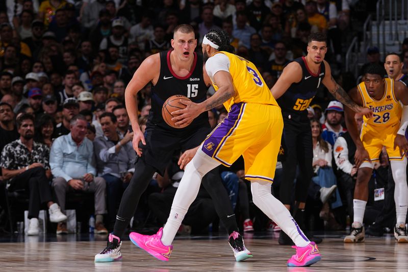 DENVER, CO - APRIL 22: Nikola Jokic #15 of the Denver Nuggets plays defense during the game against the Los Angeles Lakers on April 22, 2024 at the Ball Arena in Denver, Colorado. NOTE TO USER: User expressly acknowledges and agrees that, by downloading and/or using this Photograph, user is consenting to the terms and conditions of the Getty Images License Agreement. Mandatory Copyright Notice: Copyright 2024 NBAE (Photo by Bart Young/NBAE via Getty Images)