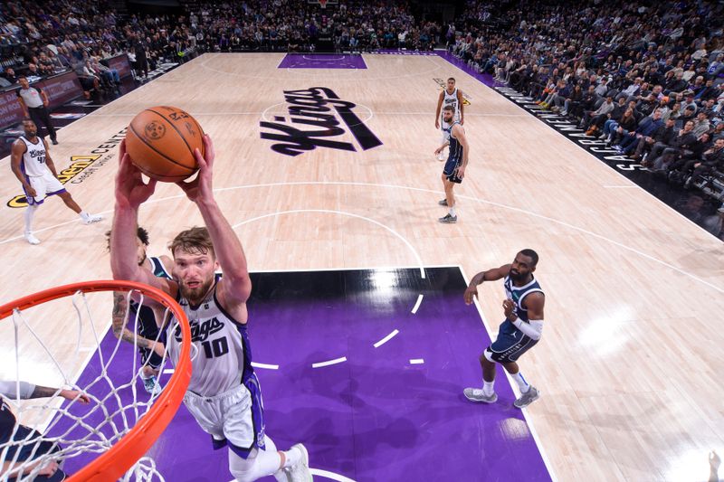 SACRAMENTO, CA - MARCH 29:  Domantas Sabonis #10 of the Sacramento Kings goes to the basket during the game on March 29, 2024 at Golden 1 Center in Sacramento, California. NOTE TO USER: User expressly acknowledges and agrees that, by downloading and or using this Photograph, user is consenting to the terms and conditions of the Getty Images License Agreement. Mandatory Copyright Notice: Copyright 2024 NBAE (Photo by Rocky Widner/NBAE via Getty Images)
