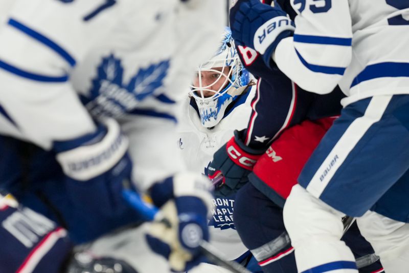 Oct 22, 2024; Columbus, Ohio, USA; Toronto Maple Leafs goaltender Dennis Hildeby (35) follows the puck in play against the Columbus Blue Jackets during the second period at Nationwide Arena. Mandatory Credit: Aaron Doster-Imagn Images