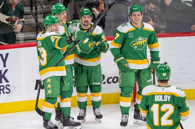 Dec 31, 2024; Saint Paul, Minnesota, USA; Minnesota Wild right wing Mats Zuccarello (36) scores and celebrates with teammates a goal against the Nashville Predators in the second period at Xcel Energy Center. Mandatory Credit: Matt Blewett-Imagn Images