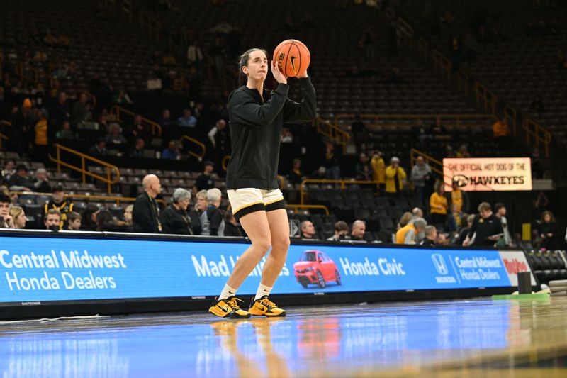 Feb 15, 2024; Iowa City, Iowa, USA; Iowa Hawkeyes guard Caitlin Clark (22) warms up before the game against the Michigan Wolverines at Carver-Hawkeye Arena. Mandatory Credit: Jeffrey Becker-USA TODAY Sports